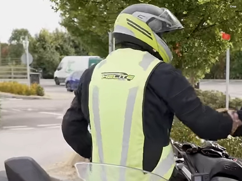 Guy wearing yellow motorcycle airbag vest 2